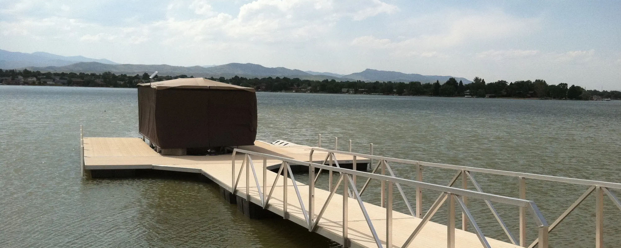 Custom Dock Systems offers sales and installation of Touchless Boat Covers.